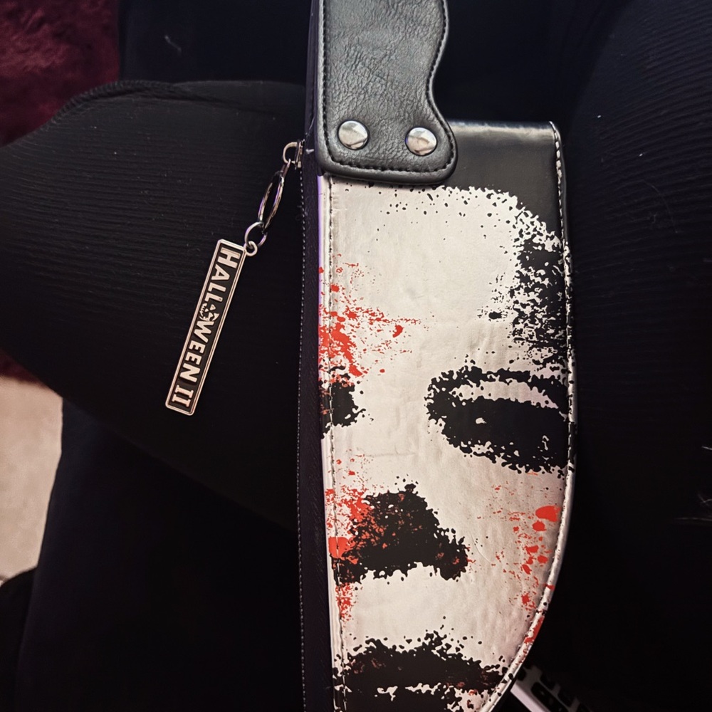 Spirit Halloween II Knife Clutch with Black and Red Accents